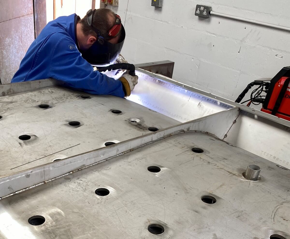 Metal fabricating engineer at HSM Engineering Ltd working on some sheet metal welding